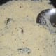 Stir-frying the semolina.
