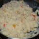 Step seven: Cover the pan and cook for 4 to 5 minutes while stirring at intervals.