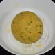 Knead, adding water little by little, to make a smooth and pliable dough.