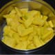 Remove the skin and seeds of the pumpkin and chop it into small cubes. Next, cook and mash them.