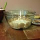I added wafers around the edge of the bowl. Just for a creative touch. Once you're done layering, put the pudding in the fridge to set.