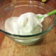Once it gets close to an hour, get another large bowl. Fold in your french vanilla pudding mix with the whipped cream. Try not to stir. It will break down the whipped cream, and you really don't want that.