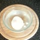 Cooling poached egg in ice water
