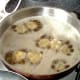 Potato crowns are deep fried in hot oil