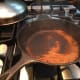 Frying spices, lot of smoke comes from this.