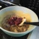 Inserting the meat into the stirred marinade... it looks suspiciously like cheese for some reason.