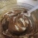 Folding in the beaten heavy cream.