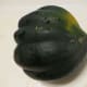 Cut both ends of the acorn squash.