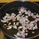 Step two: Saute garlic, onions, pepper, and nutmeg in butter till onion becomes translucent.