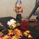 My little scarecrow watching over my ticket jar!