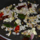 Step three: Add chopped ginger, garlic, onions, and hing powder. Saute till onions turn golden. Reduce the heat.