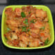 Serve the spicy tava idli in a serving bowl or plate. Garnish with finely chopped coriander leaves. Enjoy!
