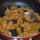 Step five: Mix well. See that there are no lumps of jaggery.
