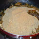 Step six: Add roasted gram dal and sesame seeds powder. Nicely mix the contents with your fingers.