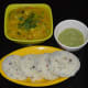 Serve with sides, like idli and chutney.