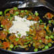 Step six: Add gram flour/besan. Nicely saute for a minute.