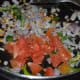 Step four: Throw in fresh peas and tomatoes. Add some salt.