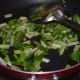Step one: Saute chopped spring onions and green peas in butter or olive oil as per instructions. Add some salt. Mix well.