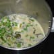 Step three: Pour three-fourth of this mix to a mixer or blender. Grind, adding water to get a smooth puree.