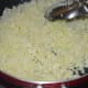 Cauliflower should be cooked yet retain some crunchiness. Transfer it to a plate.