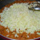 Step seven: Throw in sauteed cauliflower and mix well. Stir-cook till the mixture becomes almost dry.