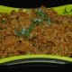 Step nine: Garnish this cauliflower keema curry with finely chopped coriander leaves.