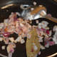 Step 5: Throw in chopped onions. Saute until they become golden brown.