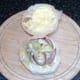 Salad is arranged on base of bread roll