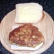 Chicken schnitzel on bread