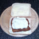 Tzatziki sauce on breaded cod