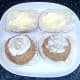 Tartare sauce is spread on smoked haddock fishcakes