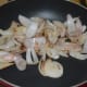 Step four: Saute onions in the same pan till they turn light golden brown on all sides. Add the onions to the plate.