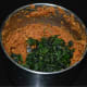 Step seven: Add sauteed fenugreek leaves. Grind or pulse until it blends completely with the other ingredients.