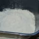 Add the flour, covering the water completely.