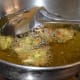 Step three: Take a teaspoon batter in your fingers. Drop it into the hot oil. Make 6-8 such fritters in a batch.