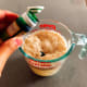 In a pitcher, add a few drops of pandan leaves essence into the yeast mixture.