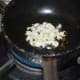 Step five: Saute garlic slices in some butter or oil.