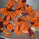 Step one: Saute cumin, ginger, garlic, and pepper corns in butter or olive oil, till cumin splutters. Add onions. Saute till they become translucent. Add chopped carrots and beetroot. Throw in some salt. Continue sauteing for 3-4 minutes.
