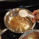 Start by melting your coconut oil in a pan on the stove.