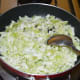 Step one: Heat a teaspoon of olive oil in a deep-bottomed non-stick pan. Add some salt.