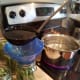 And then fill each with boiling water, only up to the neck of the jars.