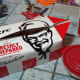 KFC popcorn chicken includes a side and a drink