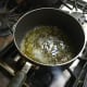 Boil the olive oil, salt, and water.