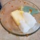 Melt your butter and coconut oil together in the microwave.