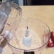 Add your flour to the bowl of the food processor.