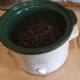 Add 1 pound of dried beans to the bottom of your crockpot (or 6 cups of cooked beans).