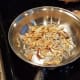 So then I crumbled about a cup into my pan and cooked my onions. For fresh onions, I would cook over medium heat until they are soft and turning brown.