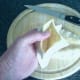 Pitta bread is halved and opened up in to cups