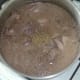 Beef stock and seasonings are added to pot