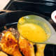 Using a spatula or spoon, pour the sauce on the chicken.